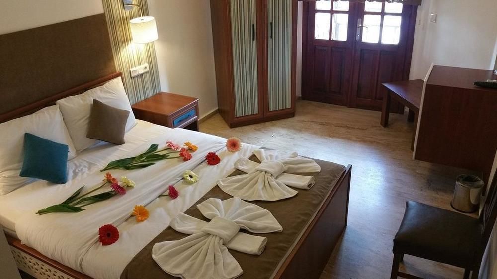 Oskay Hotel Далян Екстериор снимка