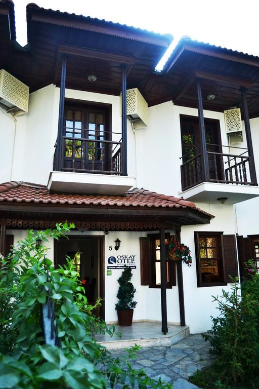 Oskay Hotel Далян Екстериор снимка