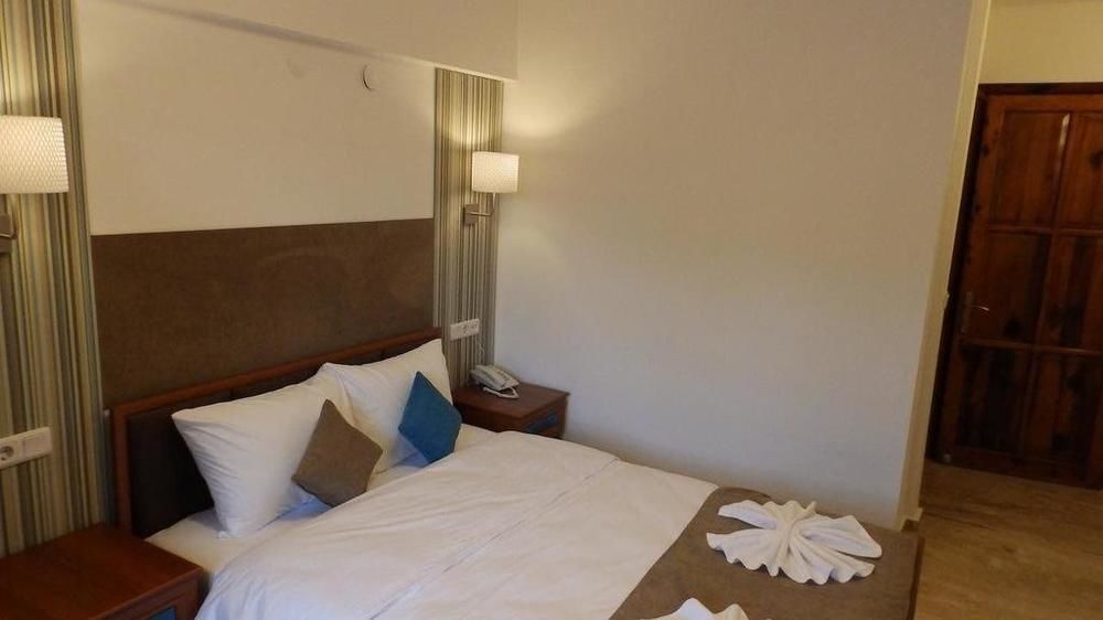 Oskay Hotel Далян Екстериор снимка