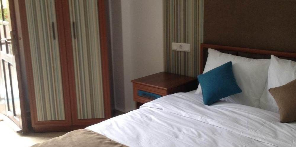 Oskay Hotel Далян Екстериор снимка