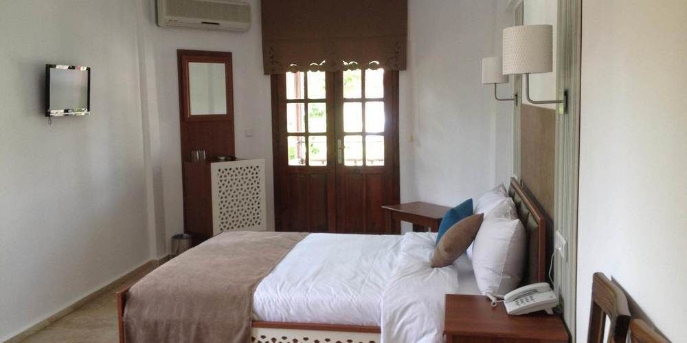 Oskay Hotel Далян Екстериор снимка