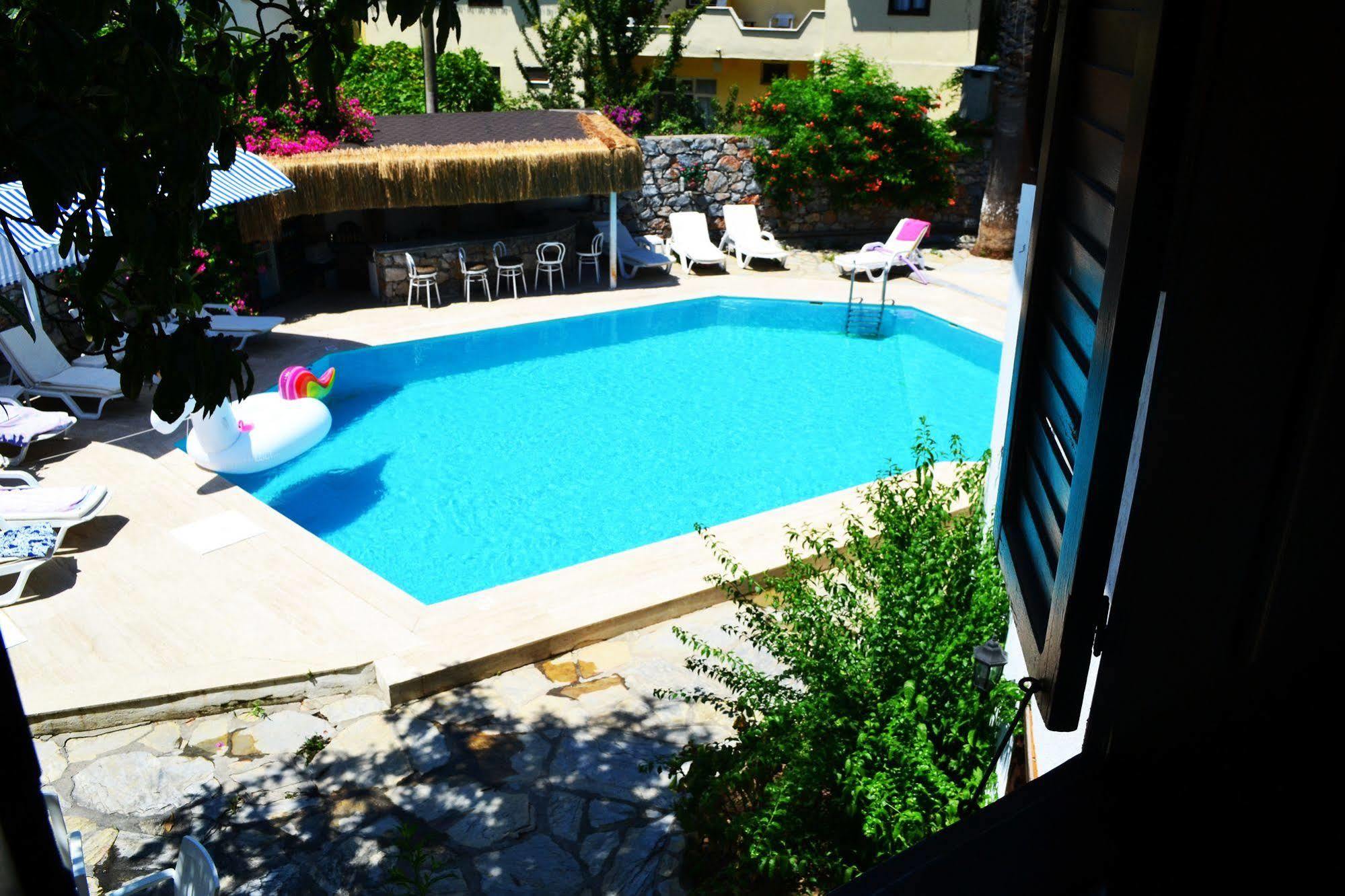 Oskay Hotel Далян Екстериор снимка