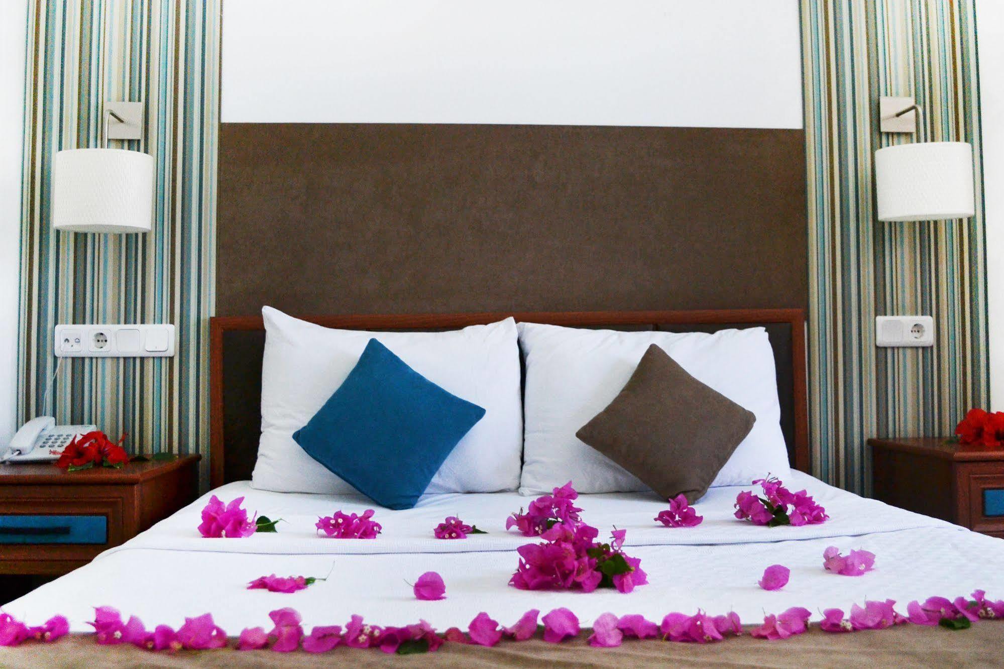 Oskay Hotel Далян Екстериор снимка
