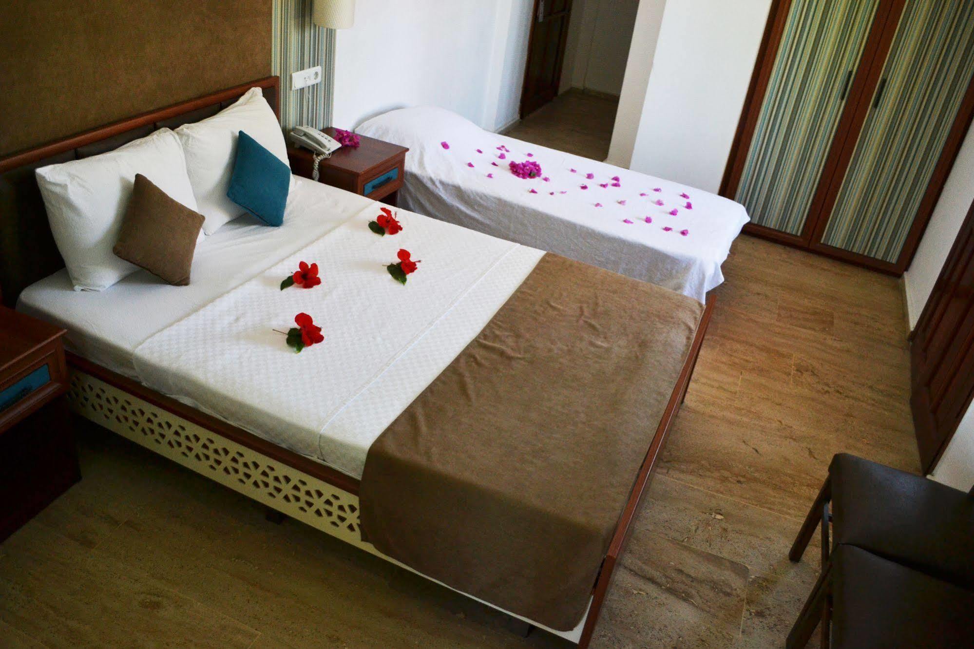 Oskay Hotel Далян Екстериор снимка